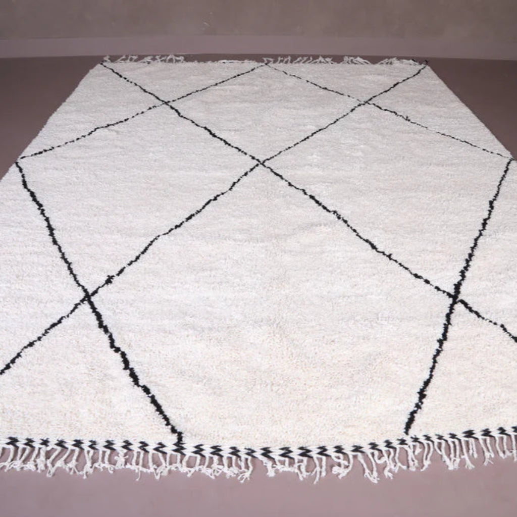 Berber area rugs and Moroccan carpets featuring traditional designs, handcrafted from high-quality materials for authentic home decor.