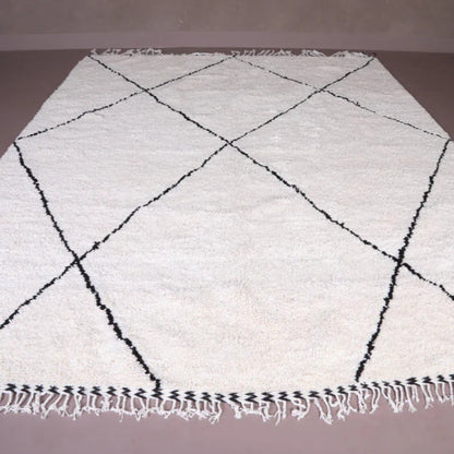 Berber area rugs and Moroccan carpets featuring traditional designs, handcrafted from high-quality materials for authentic home decor.