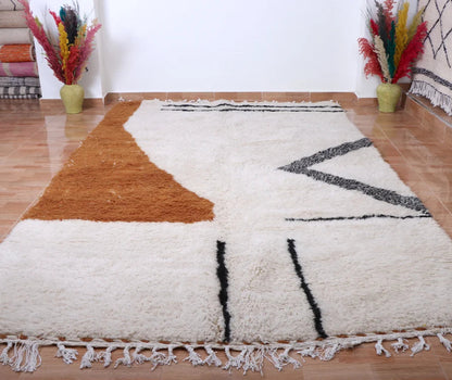 Berber area rugs and Moroccan carpets featuring traditional designs, handcrafted from high-quality materials for authentic home decor.