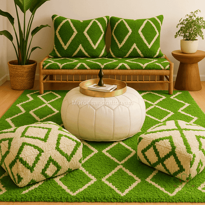 Green and beige patterned cushions on a sofa with a matching rug and decorative items.