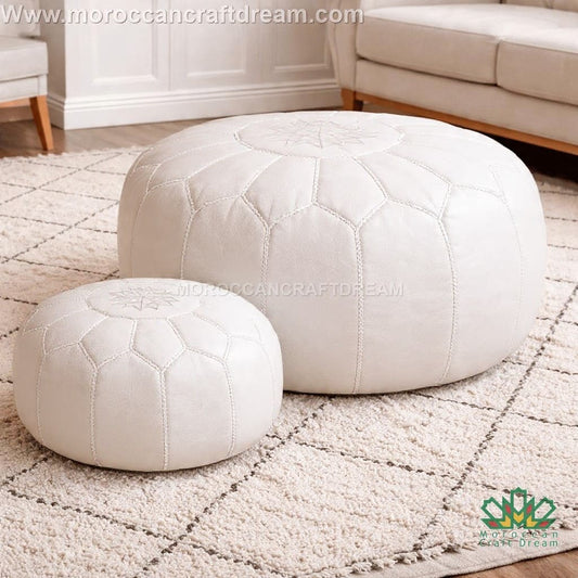 Round white leather ottoman coffee table with pouf, perfect for bohemian living room design