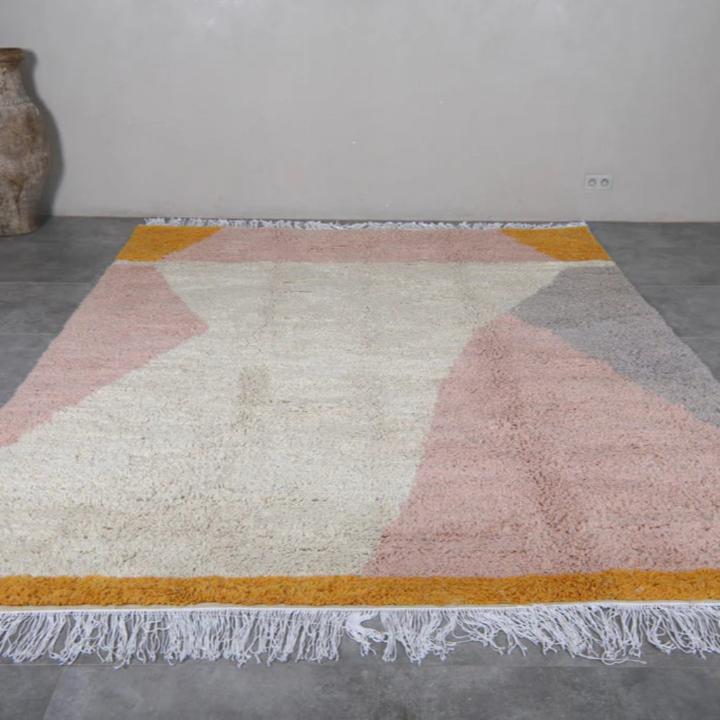 Berber area rugs and Moroccan carpets featuring traditional designs, handcrafted from high-quality materials for authentic home decor.