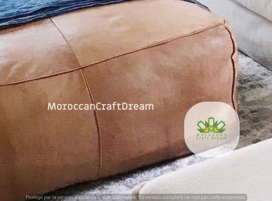 Large light caramel leather ottoman coffee table, perfect for modern living room decor, blending Moroccan pouf ottoman design with functionality. Ideal as an extra large ottoman coffee table, seamlessly fitting into furniture coffee table sets, adding style and practicality to any space.