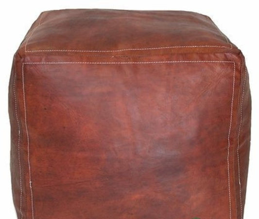 Handcrafted square leather Moroccan poufs, ottomans and footstool in natural tones, featuring traditional stitching and soft, durable materials.