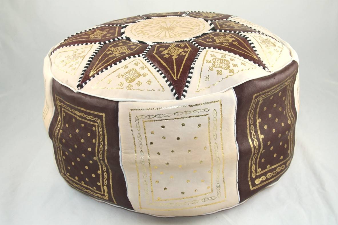 Handcrafted leather Moroccan poufs, ottomans and footstool in natural tones, featuring traditional stitching and soft, durable materials.