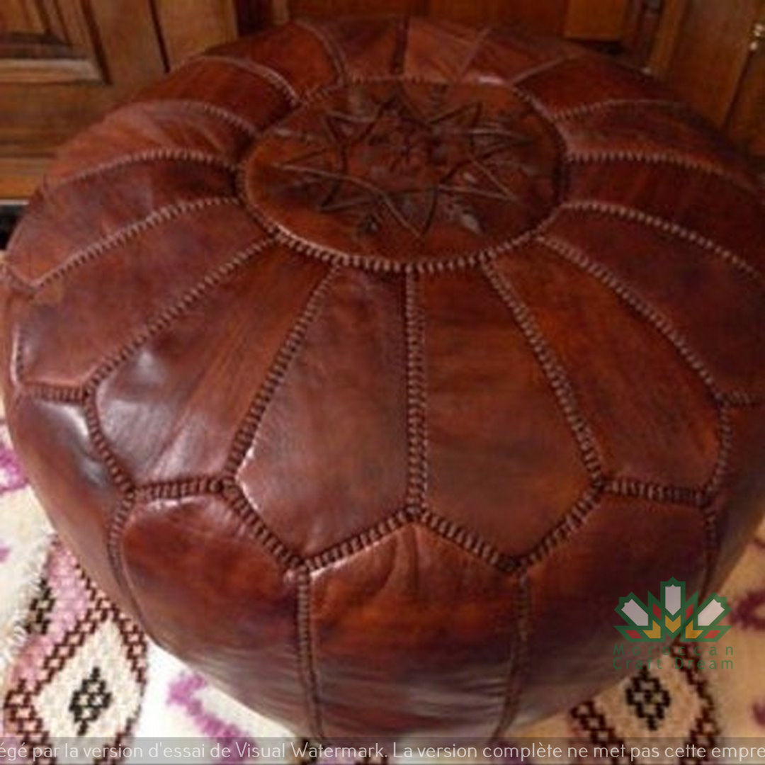 Brown Tan Handmade Moroccan leather pouf ottoman used as a coffee table, in authentic goatskin leather, perfect for versatile home decor.