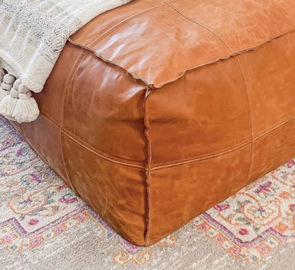 Handcrafted Caramel Moroccan leather coffee table ottoman, combining elegance and durability in one versatile furniture piece.