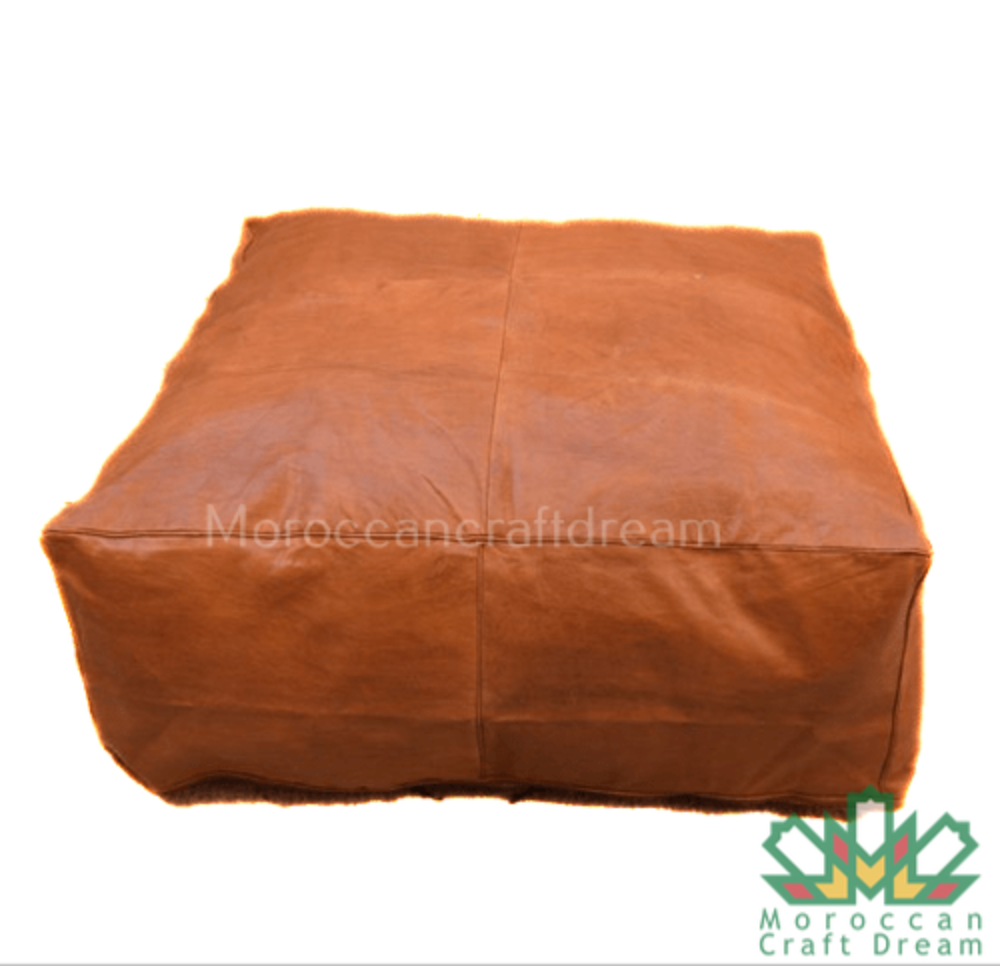 Caramel Square leather coffee table ottoman, crafted for both aesthetics and practicality in living room decor.