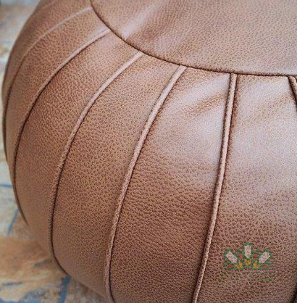 Brown chocolate Elegant Moroccan leather ottoman designed to add a touch of sophistication and versatility to any room.