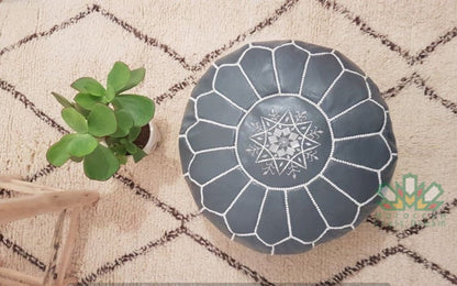 Grey Moroccan leather pouf ottoman by Moroccancraftdream, ideal for living room or bedroom decor.