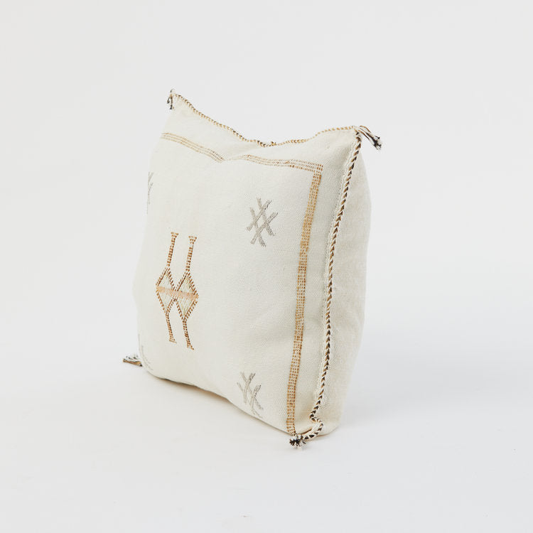 White Moroccan hand-loomed pillow cover showcasing traditional craftsmanship