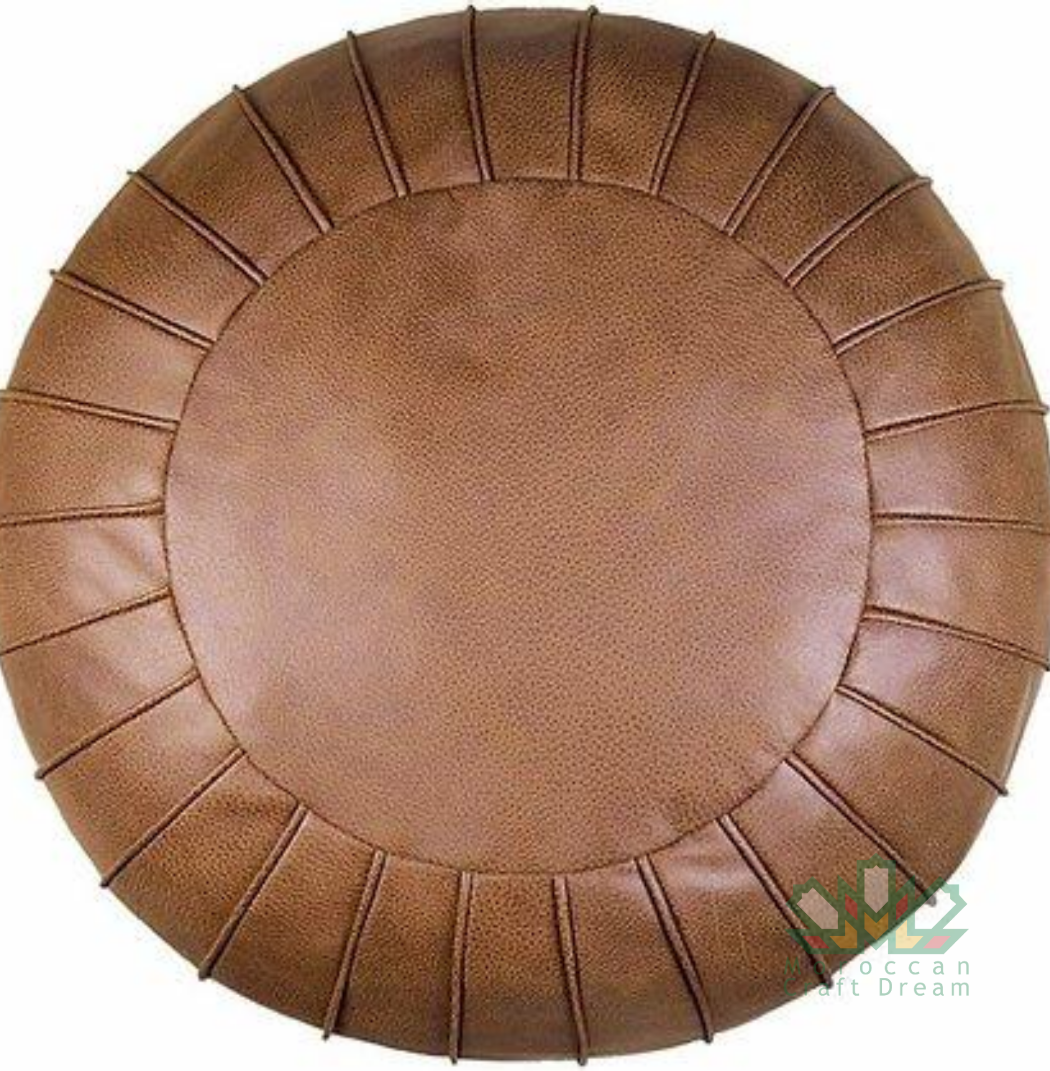 Brown Round Handmade Moroccan leather pouf with intricate geometric designs, perfect for enhancing living room style.