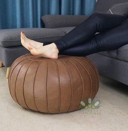 Handcrafted brown chocolate leather Moroccan pouf ottoman, ideal for home decor, crafted from authentic leather for lasting comfort.