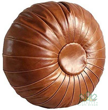 Tan Round handcrafted leather Moroccan pouf ottoman, ideal for home decor, crafted from authentic leather for lasting comfort.