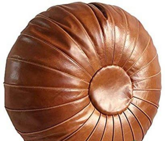 Tan Round handcrafted leather Moroccan pouf ottoman, ideal for home decor, crafted from authentic leather for lasting comfort.