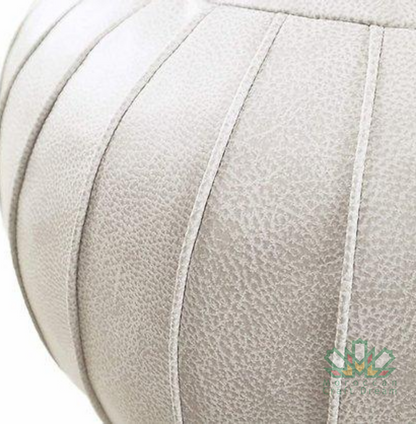 White handmade classy Authentic Moroccan leather pouf ottoman, handcrafted for use as a coffee table or footrest in any home decor.