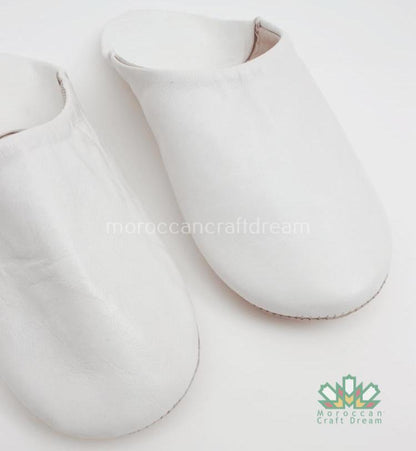 white simple handmade leather slippers, marrakech moroccan craft, bohemian style